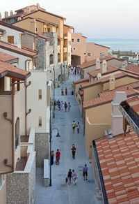 High angle view of buildings in city against sky