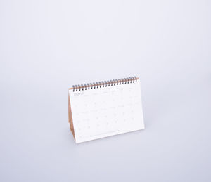 High angle view of paper flag against white background