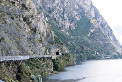 Scenic view of road by mountains