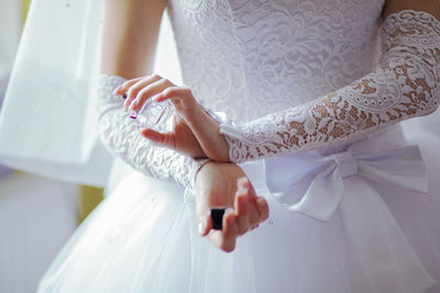 Close-up of woman holding hands