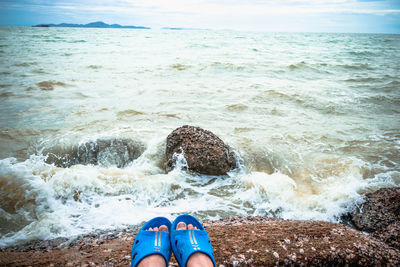 Low section of person on beach