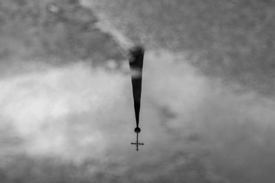 Low angle view of helicopter in sky