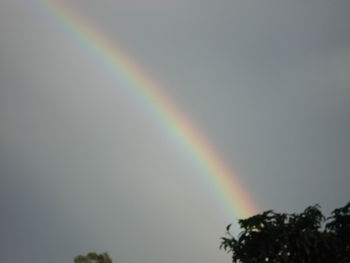 Low angle view of rainbow against clear sky