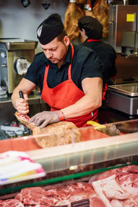 Chef preparing food in commercial kitchen