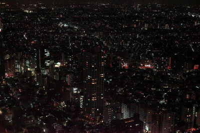 High angle view of illuminated cityscape at night