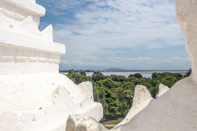 View of temple against cloudy sky