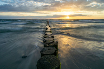 Scenic view of sea against sky during sunset