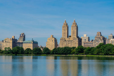 View of buildings against cloudy sky