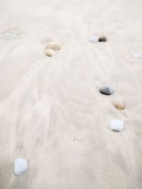 High angle view of sand on beach