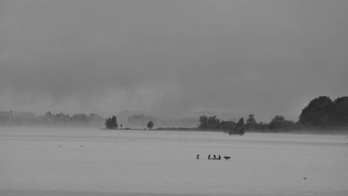 Scenic view of landscape against sky during winter