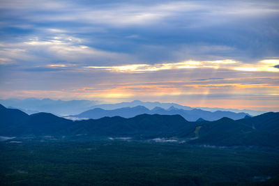 Scenic view of mountains against sky during sunset