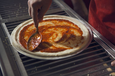High angle view of person preparing food