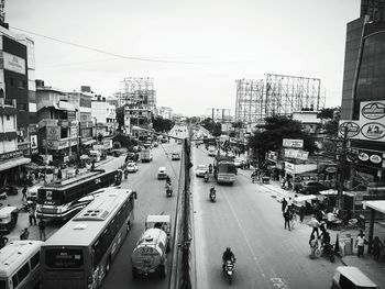 High angle view of city street and buildings against sky