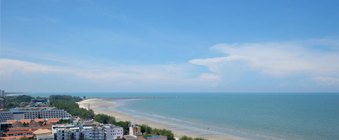 Scenic view of sea against sky in city