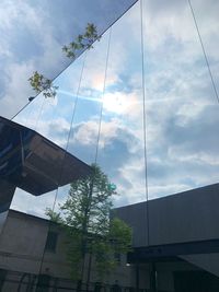 Low angle view of modern building against sky