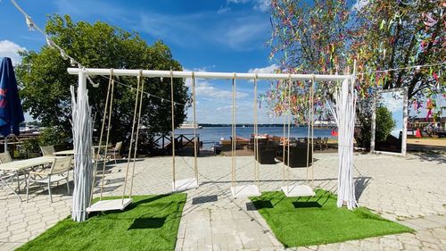 View of swimming pool in park against sky