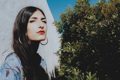 Portrait of a young woman looking away