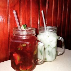 Close-up of drink in jar on table