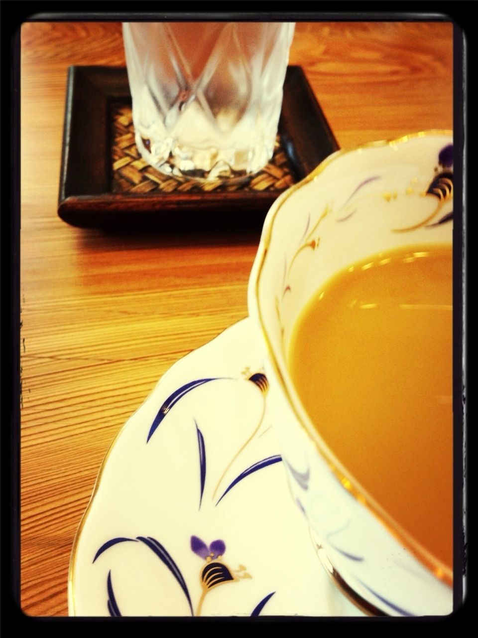 transfer print, auto post production filter, indoors, drink, table, coffee cup, food and drink, still life, refreshment, close-up, coffee, cup, coffee - drink, high angle view, spoon, drinking glass, no people, freshness, saucer, tea cup