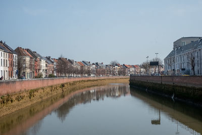 Bridge over river against clear sky