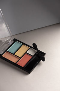 High angle view of black coffee on table