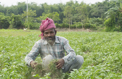 Indian farmer working at agricultural field