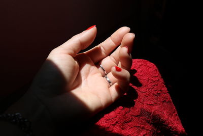 Sunlight falling on woman hand