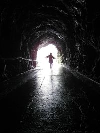 People walking in tunnel