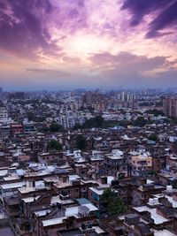 High angle view of city against sky during sunset