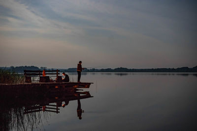 Scenic view of lake against sky during sunset