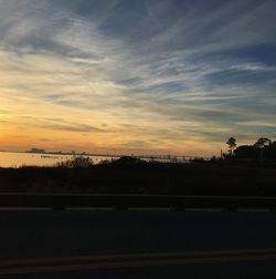 Scenic view of landscape at sunset