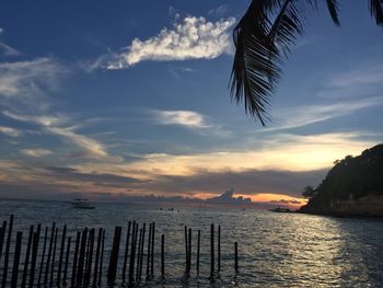 Scenic view of sea against sky at sunset