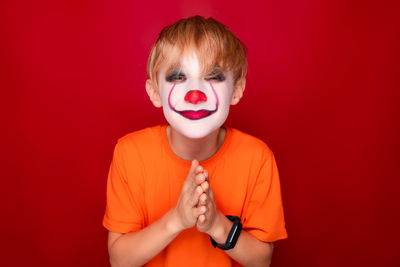 Portrait of man wearing red mask