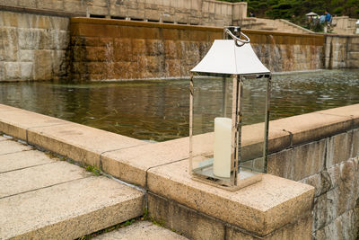 Built structure by retaining wall by lake