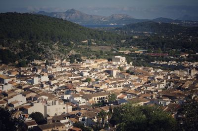 High angle view of town against mountains