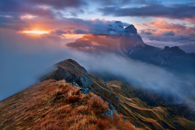 Scenic view of mountains against sky during sunset