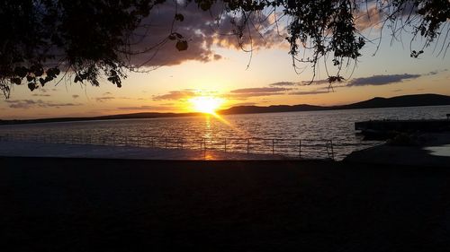 Scenic view of sea at sunset