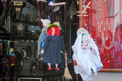 Clothes hanging on display at store