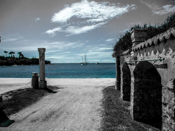 Scenic view of sea against cloudy sky