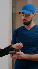 Young man using mobile phone