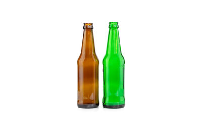 Green bottles against white background