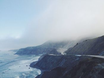 Scenic view of sea against sky during winter