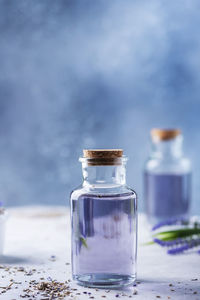 Close-up of glass jar on table