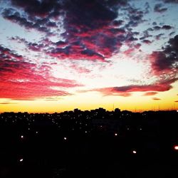 Scenic view of dramatic sky during sunset