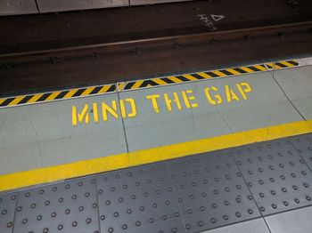 High angle view of text on subway station