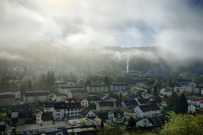 High angle view of townscape against sky in city