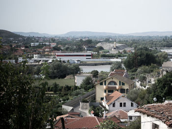 Town against clear sky