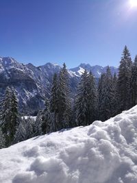 Snowcapped mountains against clear sky