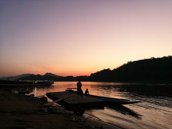 Scenic view of sea against clear sky during sunset