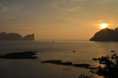 Scenic view of sea at sunset